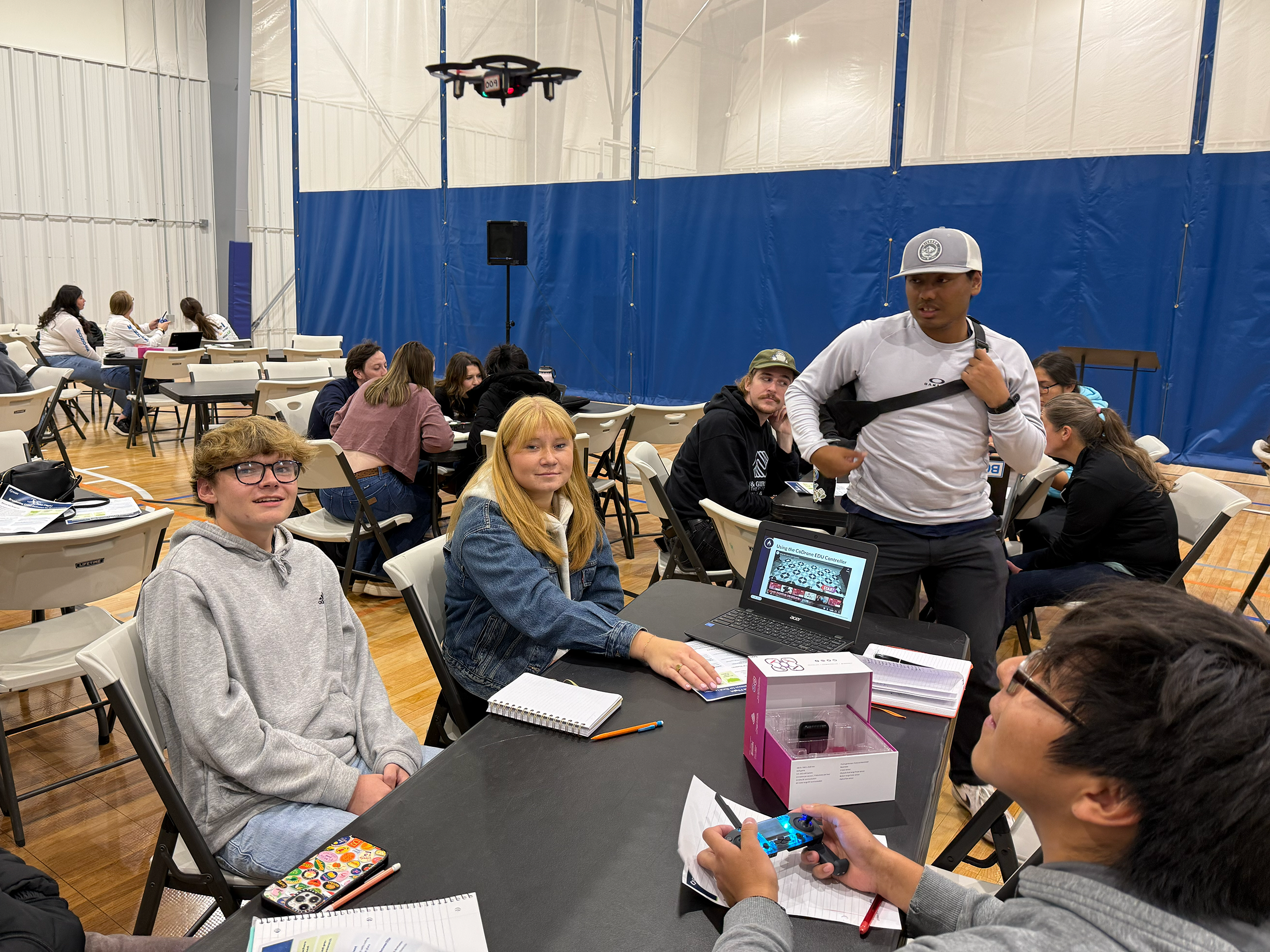 Boys and Girls Club youth leaders experimenting with a drone.