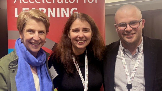 Lindsay Jones, CEO of CAST, standing next to Isabelle Hau, Executive Director of Stanford University's Accelerator for Learning, and Bobby Moore, Chief of Staff at CAST.