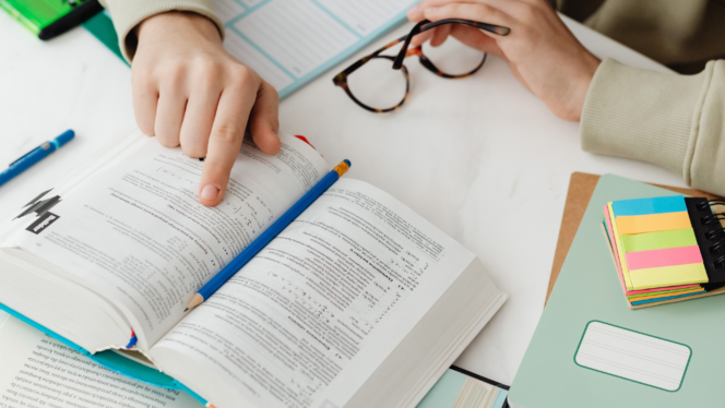 Student looking at a math text book