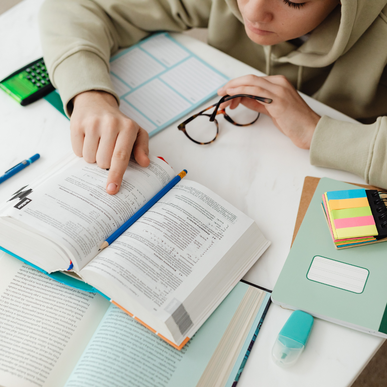 Student looking at a math text book